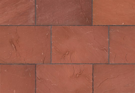 Διαμόρφωση κήπου - κόκκινη πέτρα